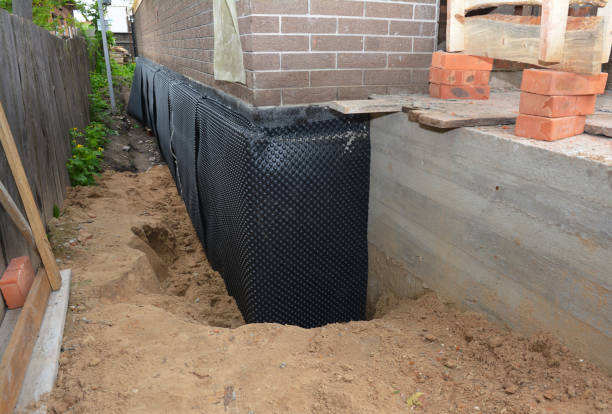 Happy homeowners after waterproofing job in Green Lane